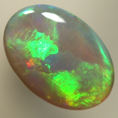 SOLID SEMI BLACK OPAL Large rolling flashes from orange to green with purple